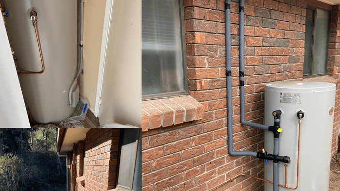 exterior of brick and tile house with water heating tanks by the side and plumbing 