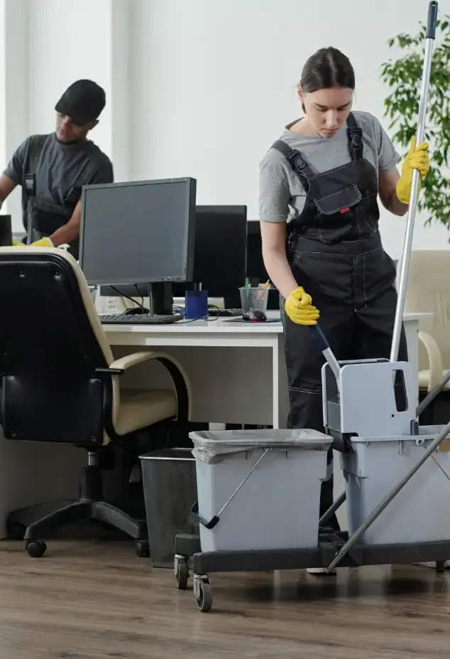 Janitorial staff working in an office