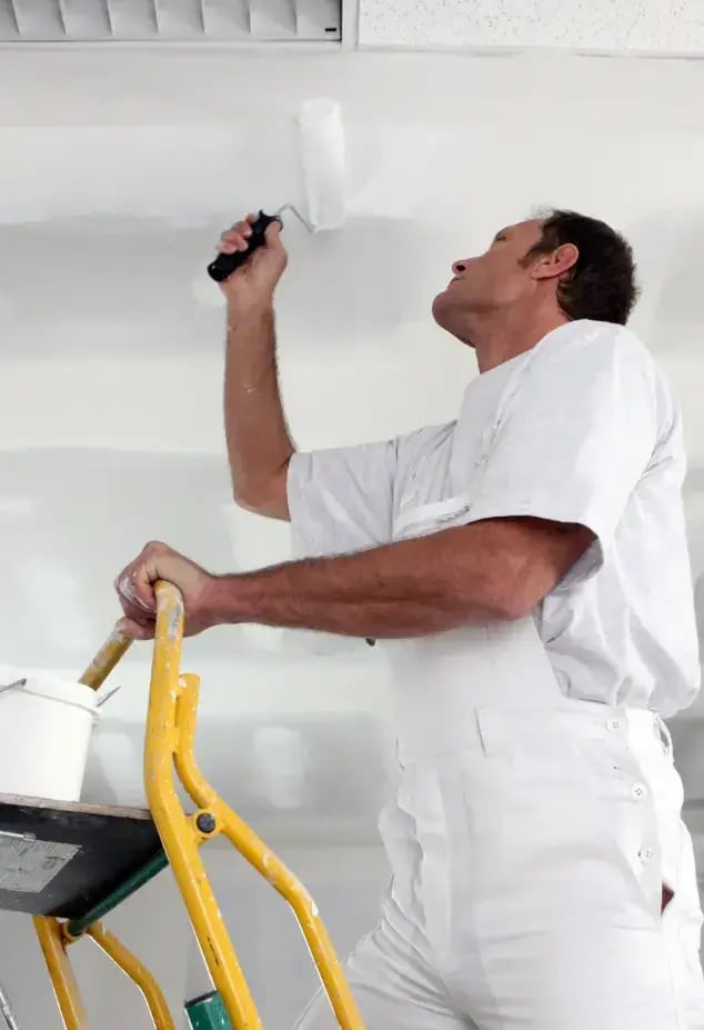 painter painting a ceiling