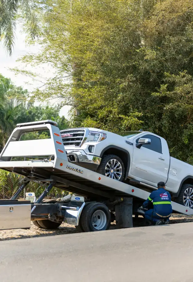 Tow truck towing a ute 