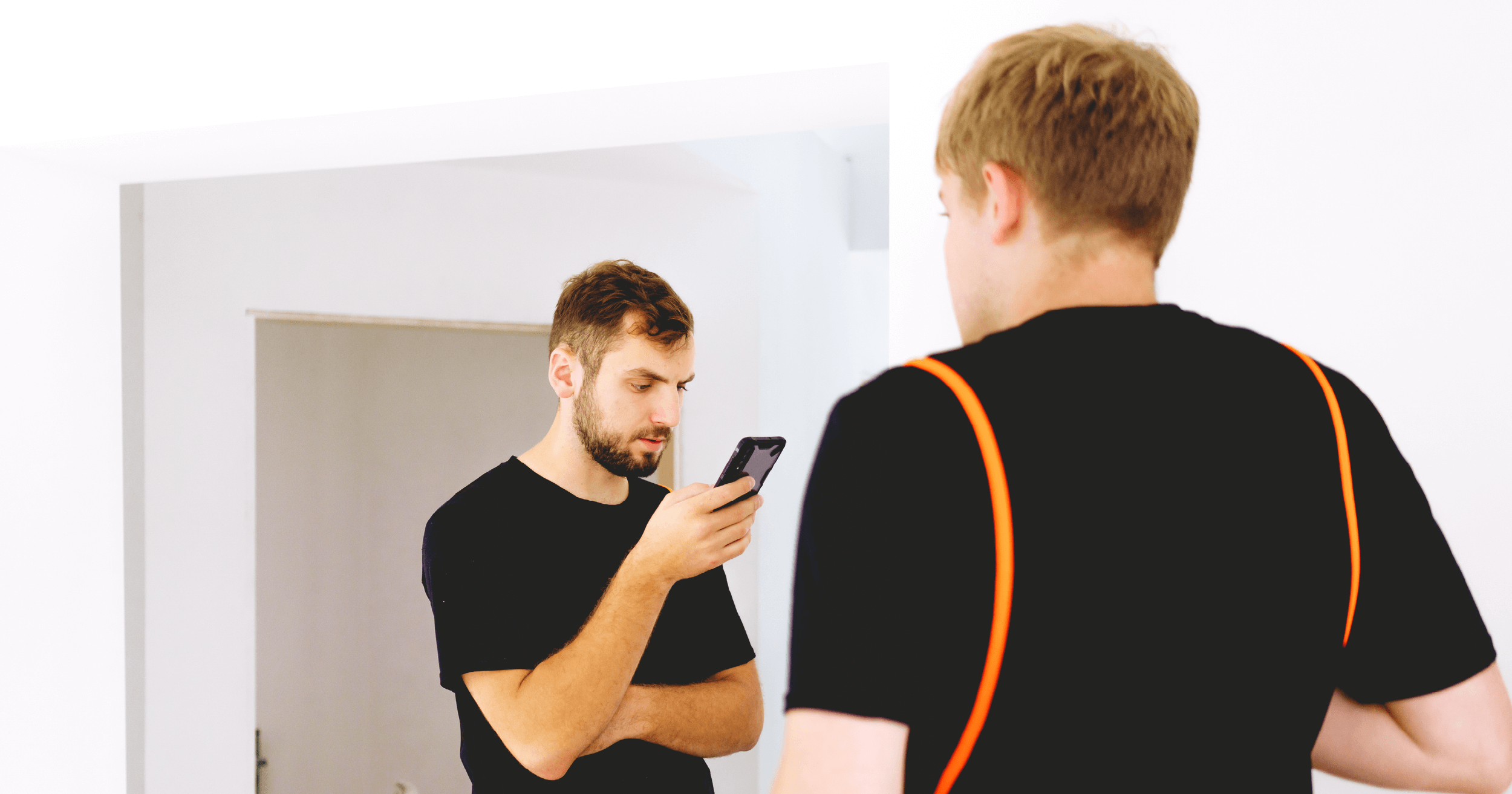 blog_bodyimage_health and safety inspector looking at his phone